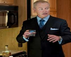 Neal McDonough consuming alcohol